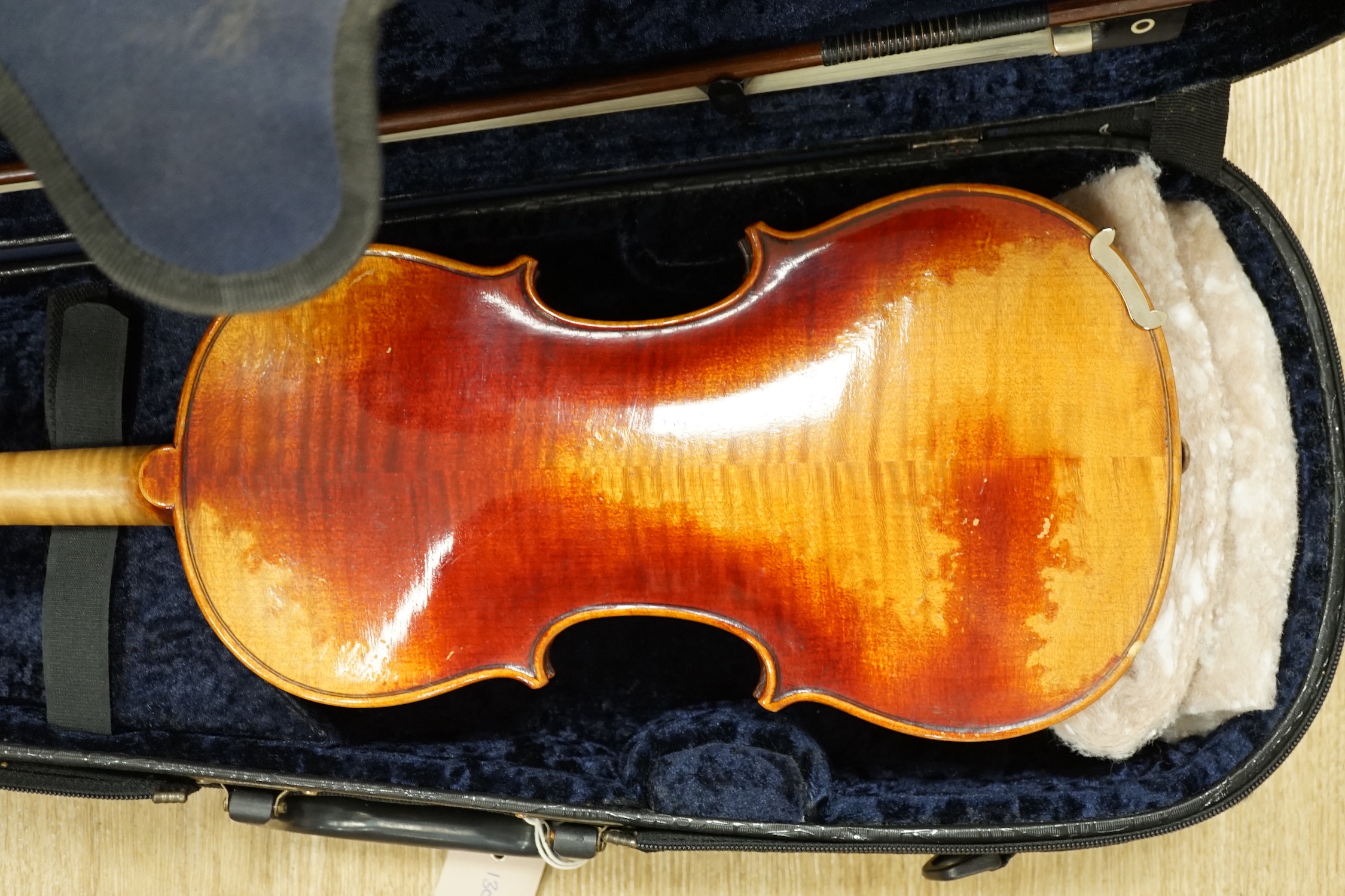 A cased fine French half size violin, Mirecourt, length of body 31.5cm with a bow and case, CITES Submission reference SLU5G6CY